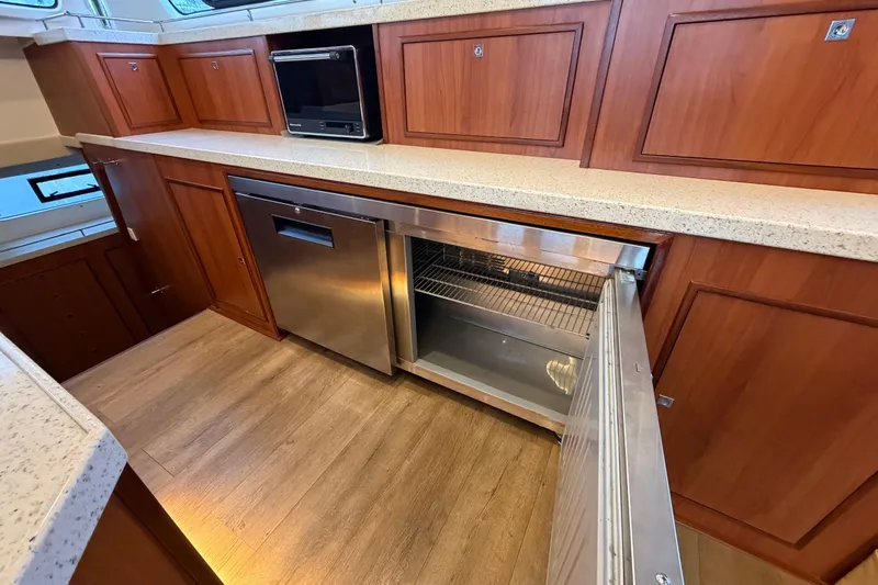 Slide: The Image of Luxurious kitchen interior of 2023 Royal Cape Catamarans Majestic 530 with modern appliances. - 117