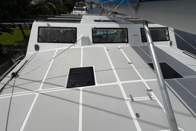 Slide: The Image of 2023 Royal Cape Catamarans Majestic 530 deck view with hatches and rigging. - 25