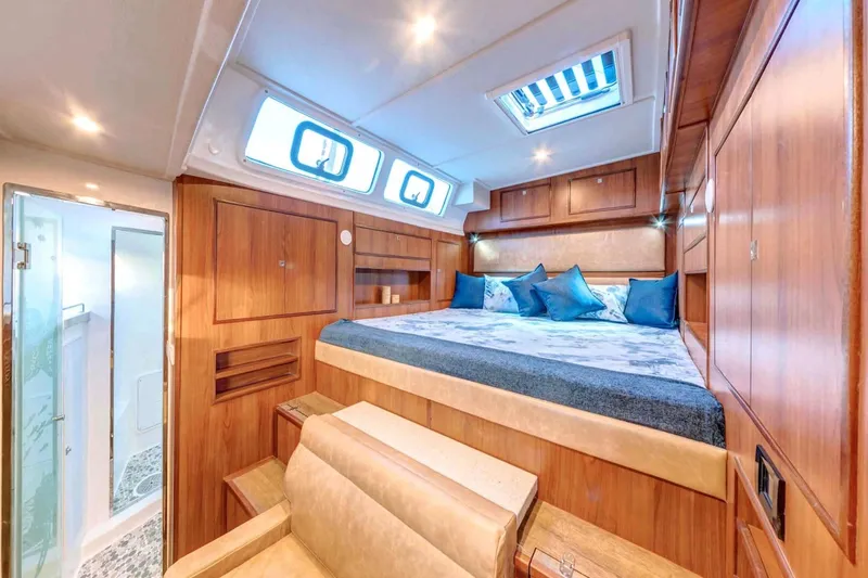 Slide: The Image of Luxurious cabin interior of 2023 Royal Cape Catamarans Majestic 530 with elegant wood finish. - 3