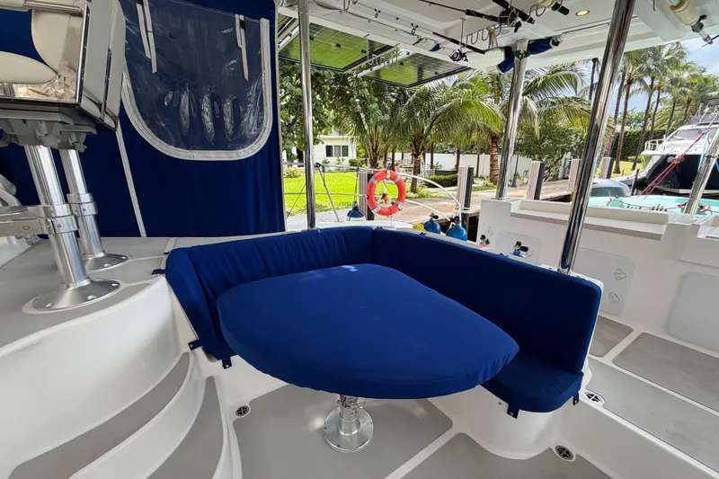 Slide: The Image of Luxurious 2023 Royal Cape Catamarans Majestic 530 interior with blue seating and modern design. - 45