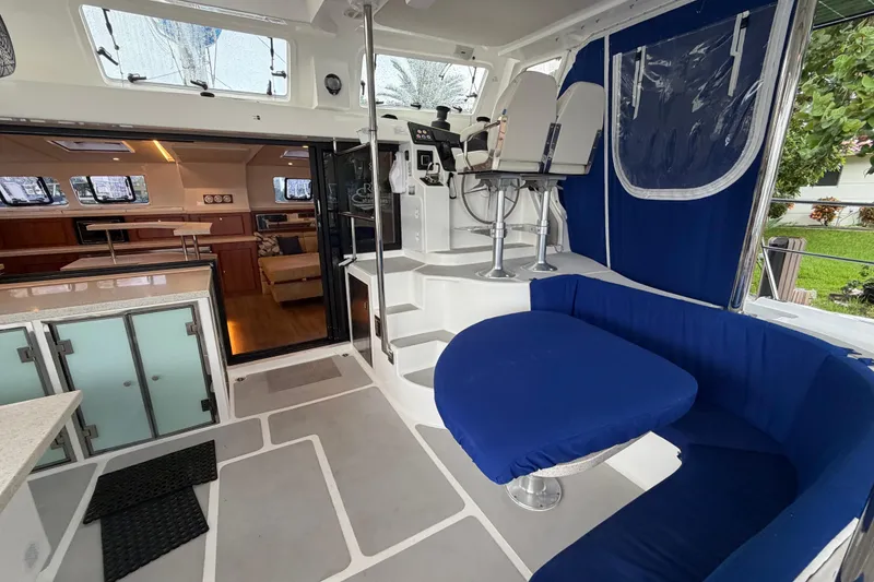 Slide: The Image of Luxurious 2023 Royal Cape Catamarans Majestic 530 interior with modern seating and helm station. - 59