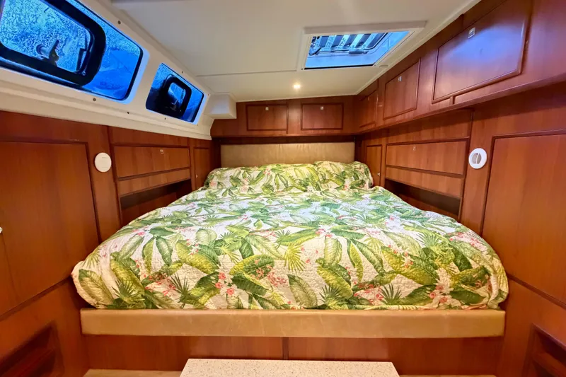 Slide: The Image of Luxurious cabin interior of 2023 Royal Cape Catamarans Majestic 530 with tropical bedding. - 77