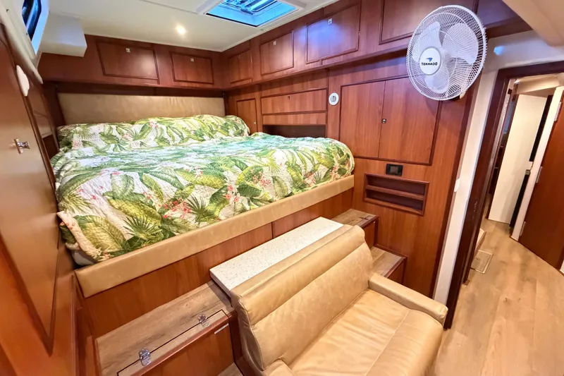 Slide: The Image of Luxurious cabin interior of 2023 Royal Cape Catamarans Majestic 530 with tropical bedding. - 79