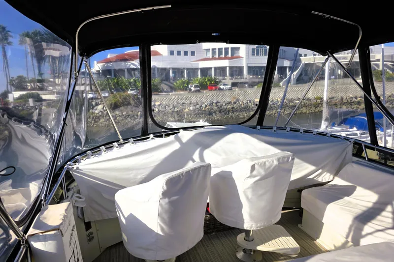 Slide: The Image of Interior view of 1990 Californian 48 Cockpit Motor Yacht with covered seating. - 5