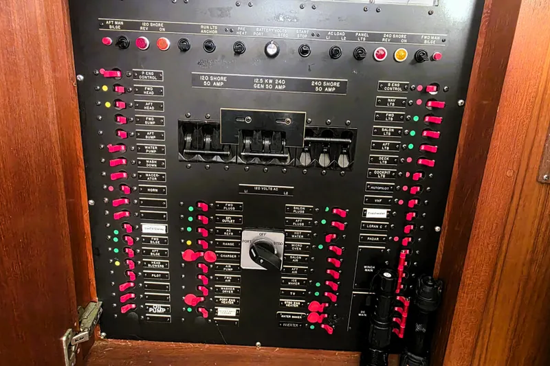 Slide: The Image of Electrical control panel on a 1990 Californian 48 Cockpit Motor Yacht. - 55