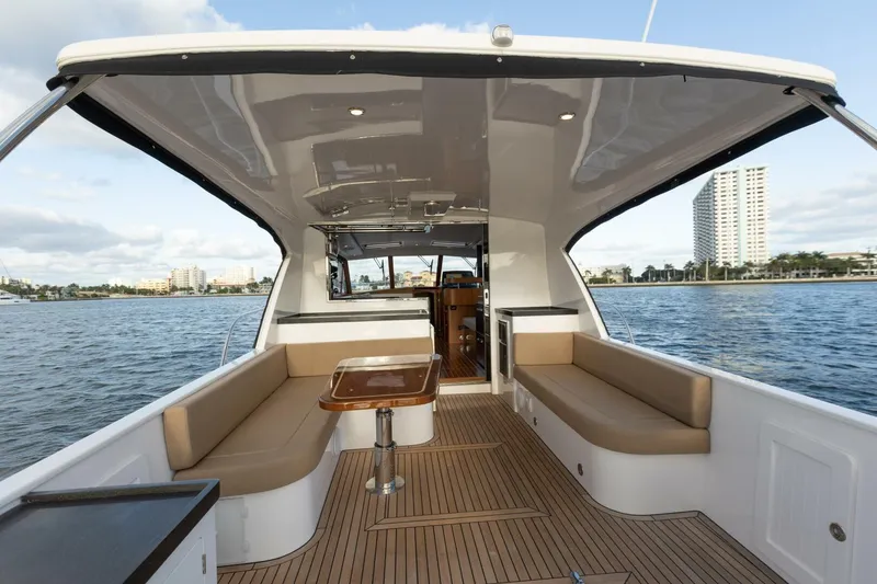 Slide: The Image of Luxurious 2026 Hylas M49 yacht interior with spacious seating and scenic waterfront view. - 11