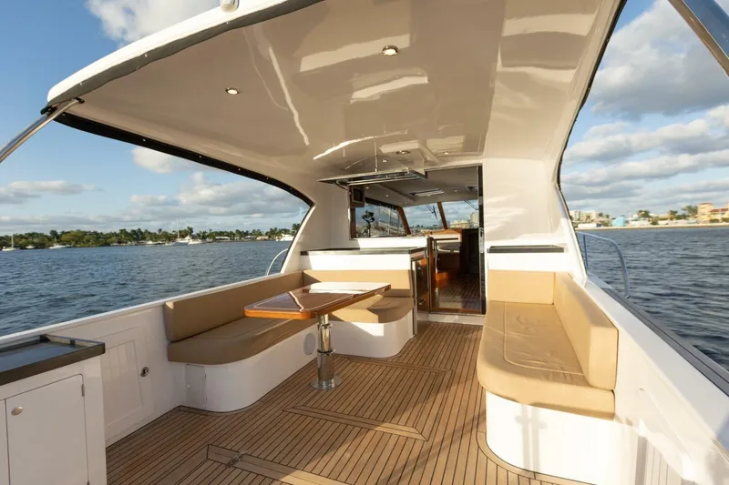 Slide: The Image of Luxurious 2026 Hylas M49 yacht interior with elegant seating and scenic ocean view. - 12