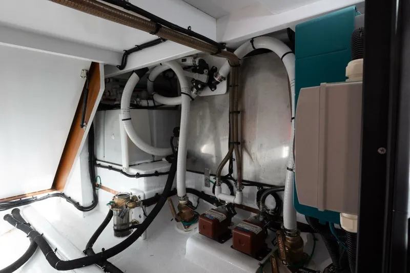 Slide: The Image of Engine room of 2026 Hylas M49 yacht with complex piping and machinery. - 26