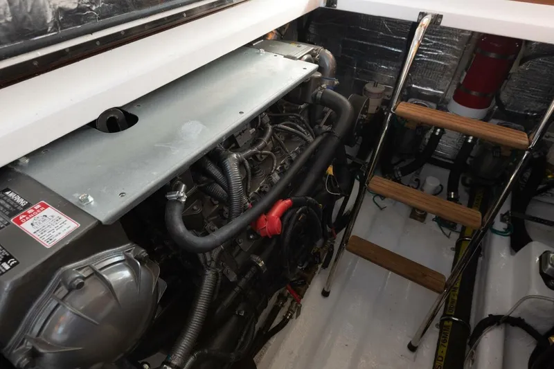 Slide: The Image of Engine room of 2026 Hylas M49 yacht with visible machinery and ladder. - 27