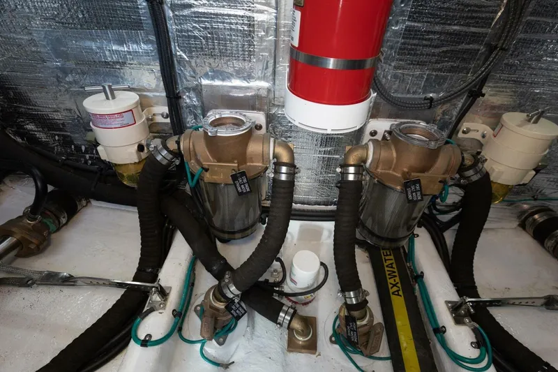 Slide: The Image of Engine room of 2026 Hylas M49 yacht with filters and fire extinguisher. - 28
