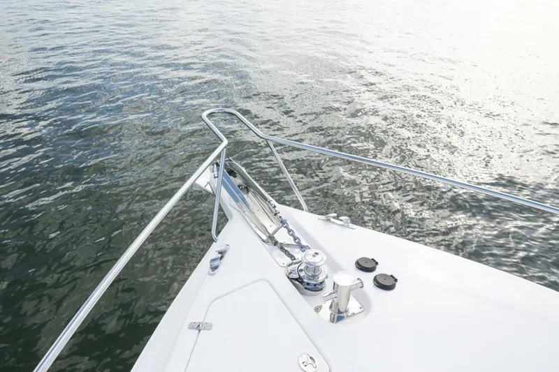 Slide: The Image of Bow of 2026 Hylas M49 yacht on calm water. - 6
