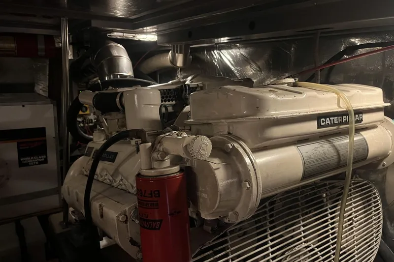 Slide: The Image of Clean engine room with twin Caterpillar 3208 T diesels. - 21