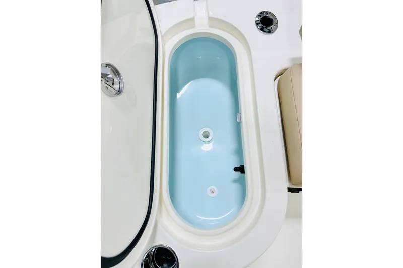 Slide: The Image of Livewell on 2026 Scout 231 XSB boat, featuring sleek design and functionality. - 16