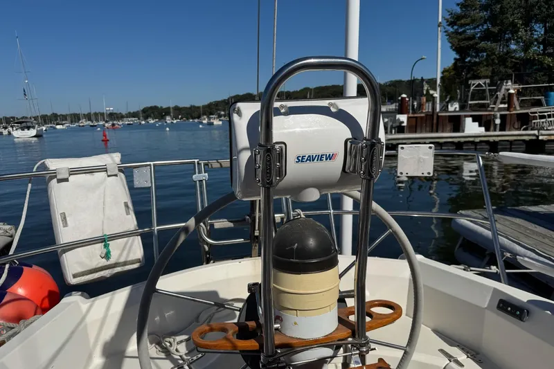 Slide: The Image of Cockpit view of 1989 Sabre 30 MKIII sailboat with Seaview equipment, docked in marina. - 11
