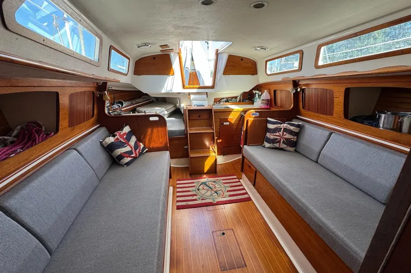Slide: The Image of Interior of 1989 Sabre 30 MKIII sailboat with wooden finish and cozy seating. - 35