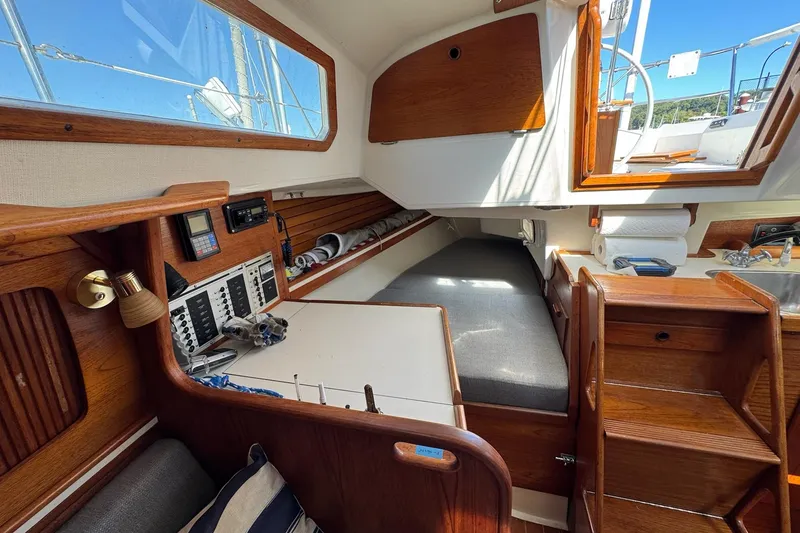 Slide: The Image of Interior of 1989 Sabre 30 MKIII sailboat with wood finish and navigation equipment. - 45
