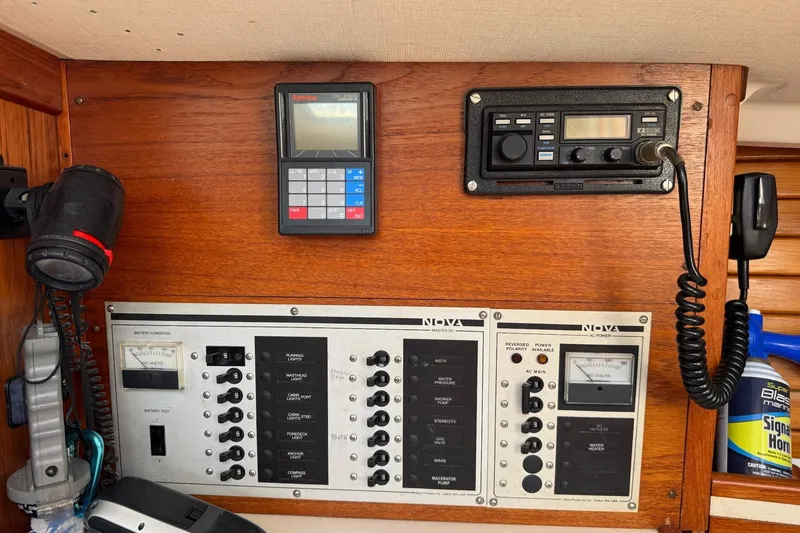 Slide: The Image of Control panel of a 1989 Sabre 30 MKIII sailboat with navigation and communication equipment. - 46