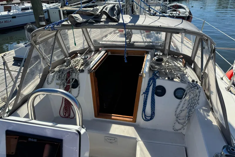 Slide: The Image of Cockpit of 1989 Sabre 30 MKIII sailboat with ropes and navigation equipment. - 8