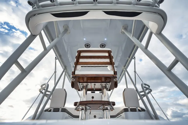 Slide: The Image of 2022 Yellowfin 54 Offshore boat interior with sleek design and modern seating. - 11
