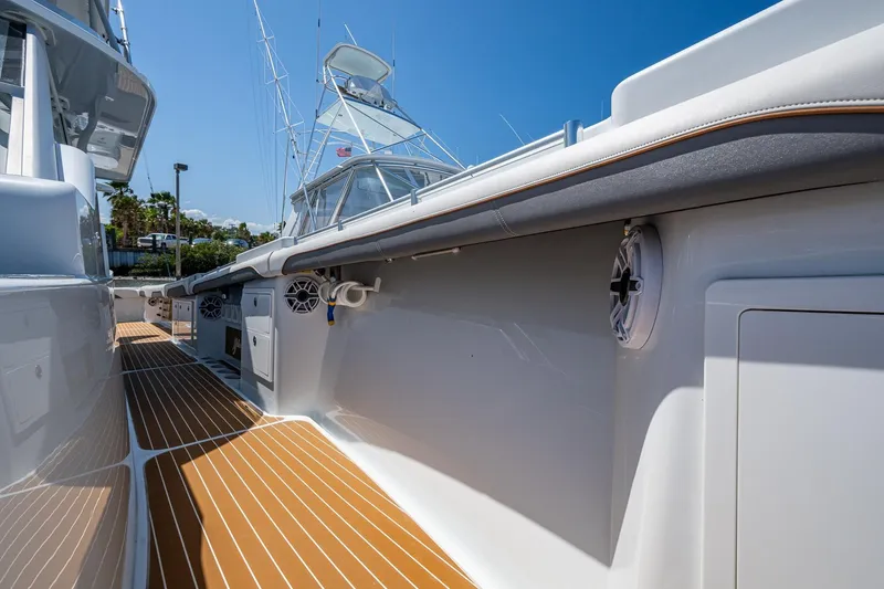 Slide: The Image of 2022 Yellowfin 54 Offshore boat deck with sleek design and modern features. - 35