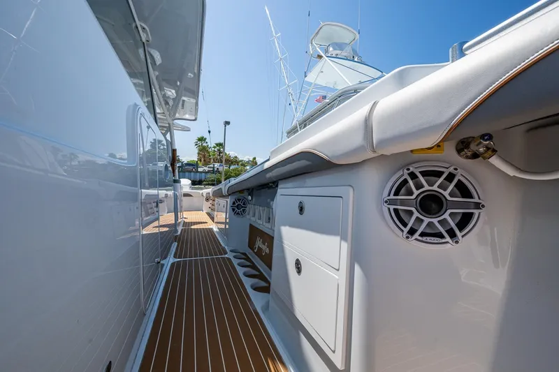 Slide: The Image of 2022 Yellowfin 54 Offshore boat deck with sleek design and modern features. - 36