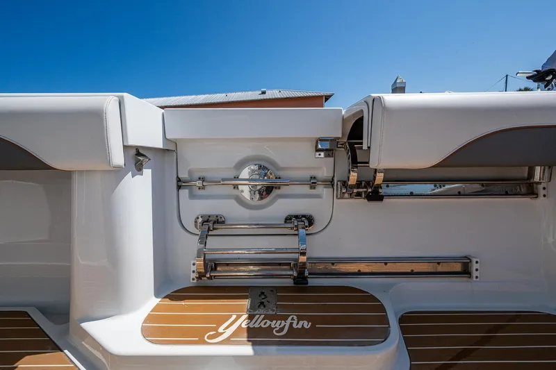Slide: The Image of 2022 Yellowfin 54 Offshore boat interior with sleek design and polished metal accents. - 60