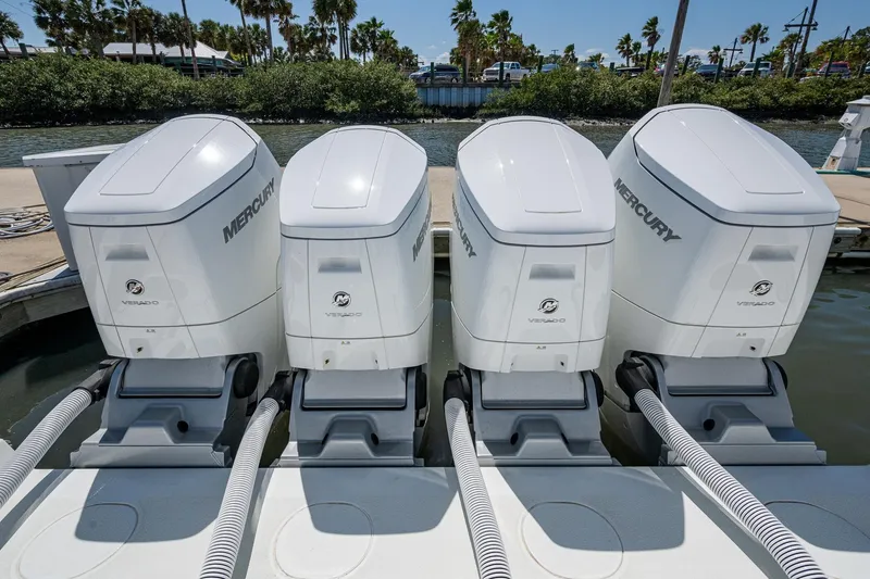Slide: The Image of Four Mercury Verado outboard engines on a 2022 Yellowfin 54 Offshore boat. - 63