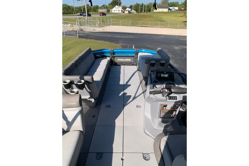 Slide: The Image of 2023 Seadoo Switch Cruise 21 interior with seating and control console. - 6