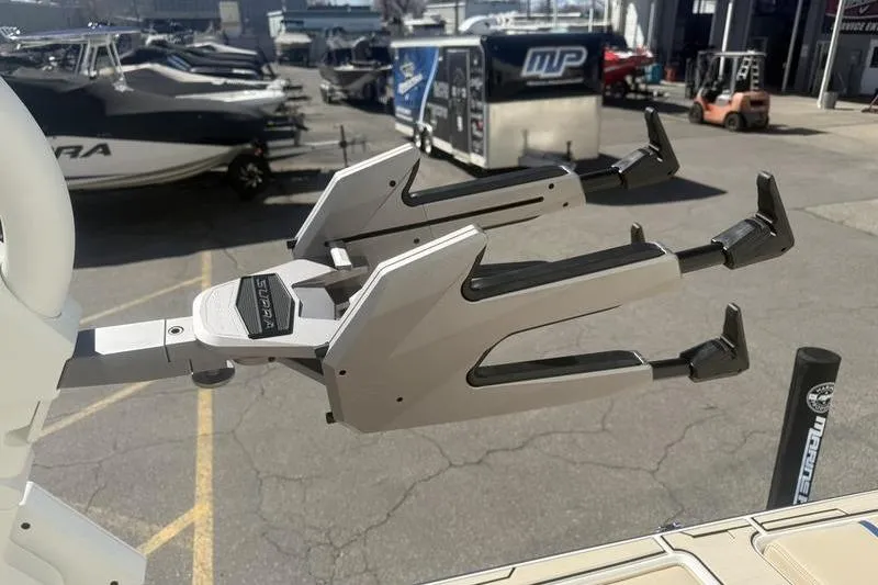 Slide: The Image of 2025 Supra SV 575 boat accessory in a marina setting. - 7