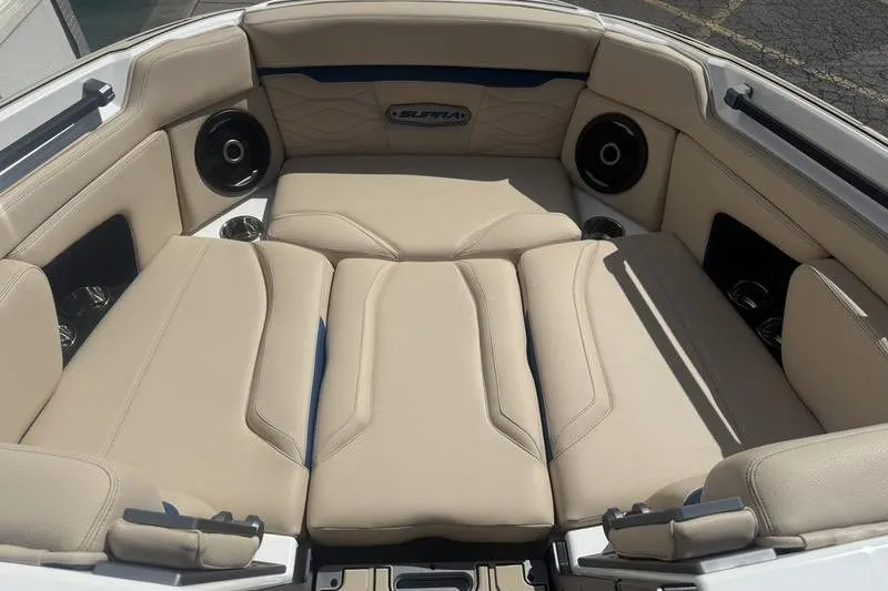 Slide: The Image of Luxurious interior of 2025 Supra SV 575 boat with beige seating and speakers. - 9