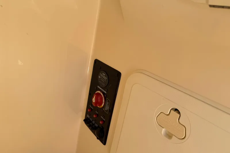 Slide: The Image of Control panel on 2012 Scout 240 Bay Scout boat interior. - 13