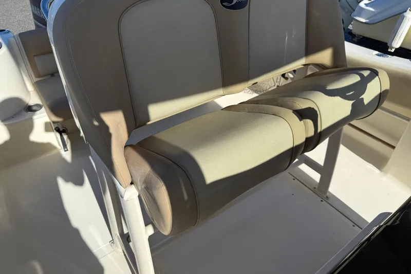 Slide: The Image of 2012 Scout 240 Bay Scout boat seat with beige upholstery. - 22