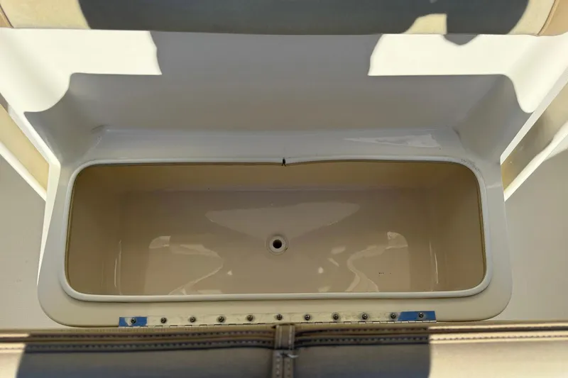 Slide: The Image of 2012 Scout 240 Bay Scout boat storage compartment, open and empty. - 30