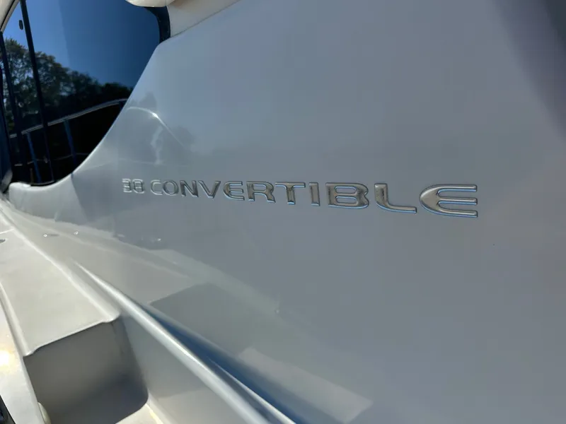 Slide: The Image of 2004 Silverton 38 Convertible yacht with sleek exterior design. - 11