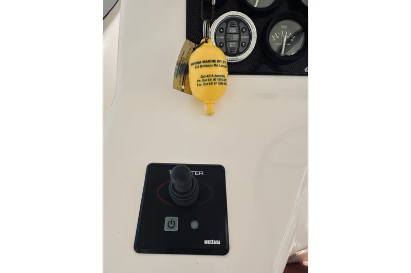 Slide: The Image of Simrad navigation system on 2000 Riviera 40 yacht dashboard. - 21