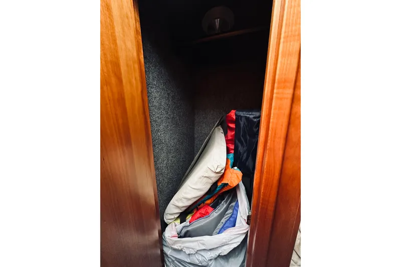 Slide: The Image of Bunk beds in 2000 Riviera 40 yacht cabin, featuring patterned mattresses and cozy interior. - 53