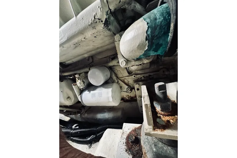 Slide: The Image of Engine compartment of a 2000 Riviera 40 with Kohler power system components. - 63