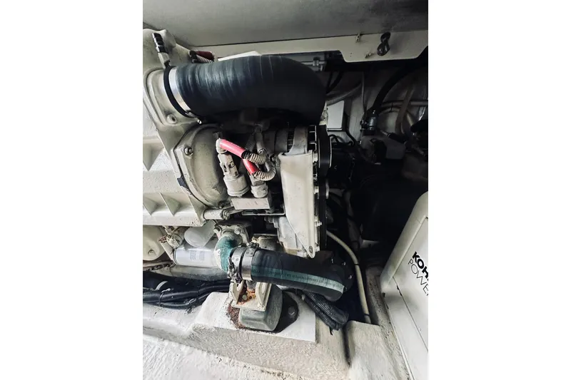 Slide: The Image of Engine room of a 2000 Riviera 40 yacht, featuring Kohler power system components. - 65