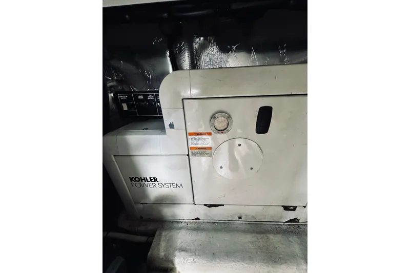 Slide: The Image of Kohler power system in 2000 Riviera 40 yacht engine room. - 84