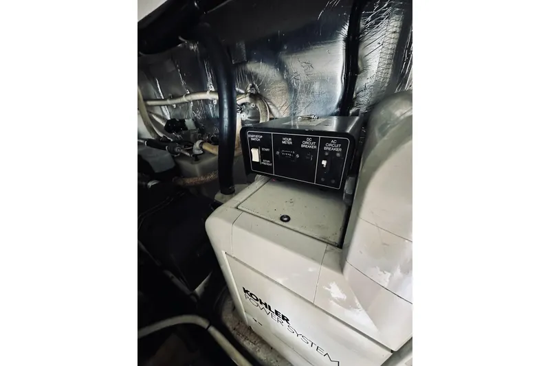 Slide: The Image of Engine room of 2000 Riviera 40 yacht with Kohler power system. - 86