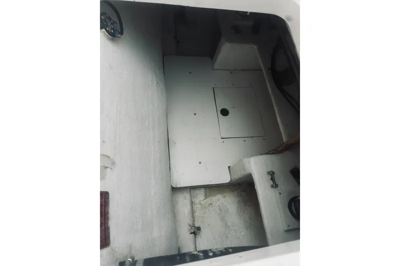 Slide: The Image of Interior view of a 2000 Riviera 40 boat, showcasing storage compartment. - 89