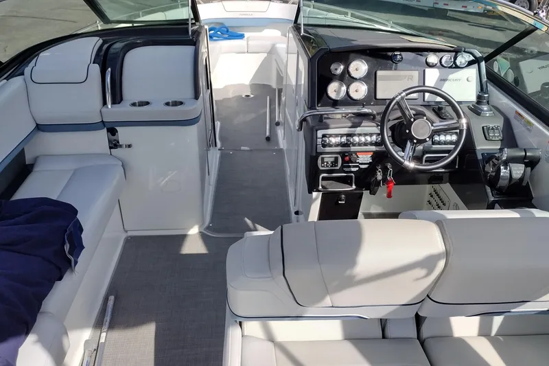 Slide: The Image of 2019 Formula 310 Bowrider interior with modern dashboard and seating. - 12