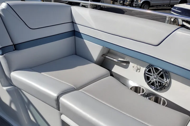 Slide: The Image of Luxurious seating on 2019 Formula 310 Bowrider with speaker and cup holders. - 21