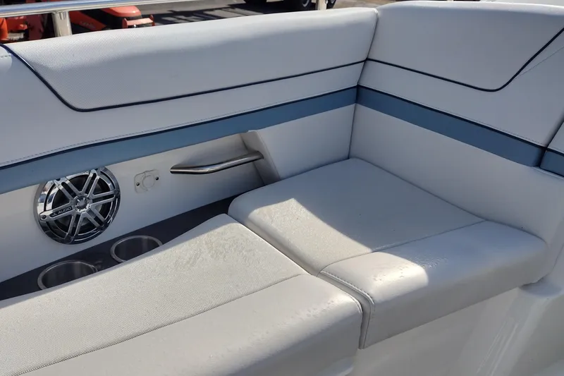 Slide: The Image of 2019 Formula 310 Bowrider interior seating with speaker and cup holders. - 22
