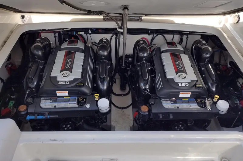 Slide: The Image of Twin engines in a 2019 Formula 310 Bowrider boat, showcasing powerful performance. - 36