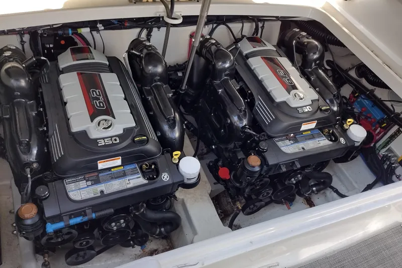 Slide: The Image of Twin Mercury 6.2L 350 engines in a 2019 Formula 310 Bowrider boat. - 37