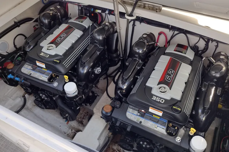 Slide: The Image of Twin Mercury 6.2L 350 engines in a 2019 Formula 310 Bowrider boat. - 38