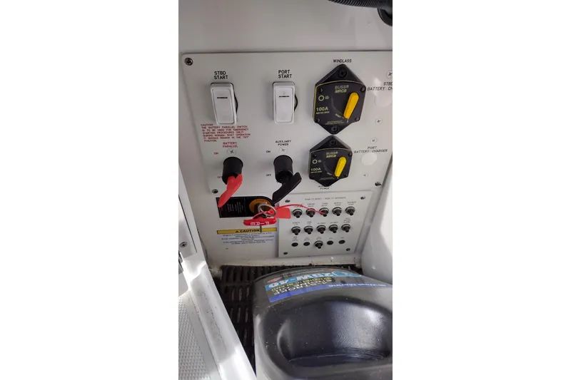 Slide: The Image of Control panel of a 2019 Formula 310 Bowrider boat with switches and battery controls. - 40