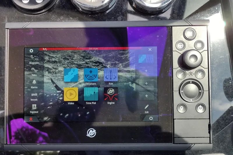 Slide: The Image of Control panel of a 2019 Formula 310 Bowrider boat with navigation display. - 42