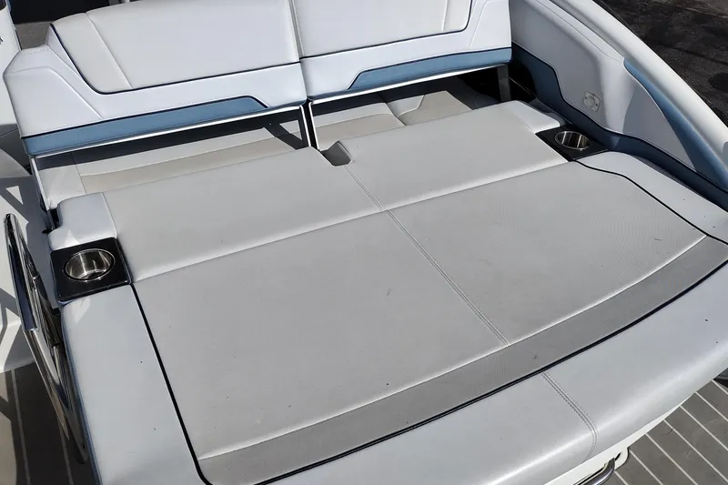 Slide: The Image of 2019 Formula 310 Bowrider boat with spacious seating and cup holders. - 44